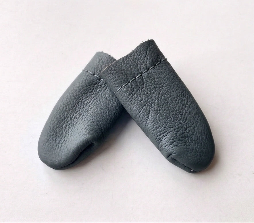 Proteção de dedos para feltragem